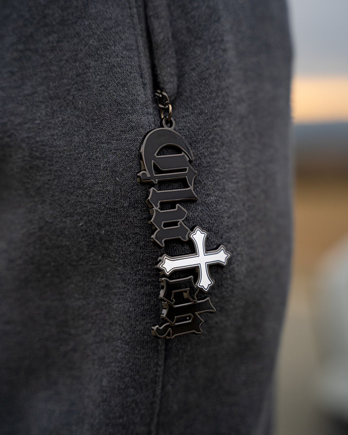 "Clutch" Metal Keychain